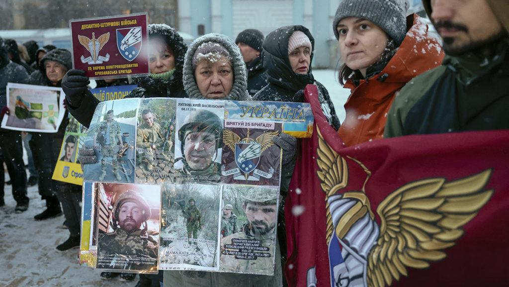 Ukrainians gather Dec. 8, 2022, at Mykhailivs’ka Square in Kyiv, Ukraine, demanding the liberation of their loved ones in a prisoner exchange with Russia. Russia got back 63 servicemen and Ukraine received 116 prisoners Feb. 4.