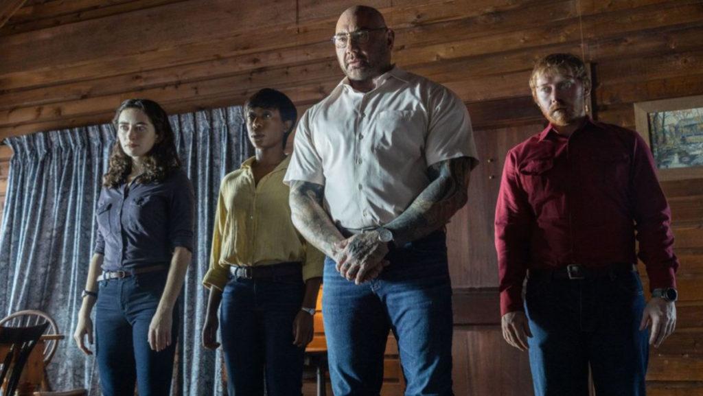 From left, Adriane (Abby Quinn), Sabrina (Nikki Amuka-Bird), Leonard (Dave Bautista) and Redmond (Rupert Grint) take a family hostage to make an impossible choice in Knock at the Cabin.