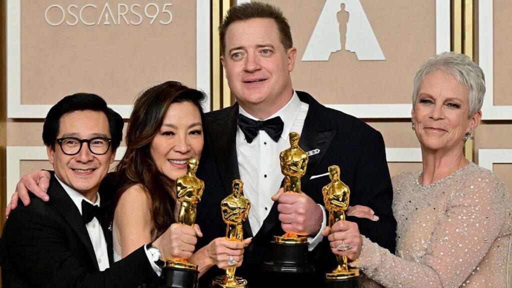 From left, Ke Huy Quan, Michelle Yeoh, Brendan Fraser and Jamie Lee Curtis pose with their Oscars. Three of the four acting wins this year went to A24s Everything Everywhere All at Once.