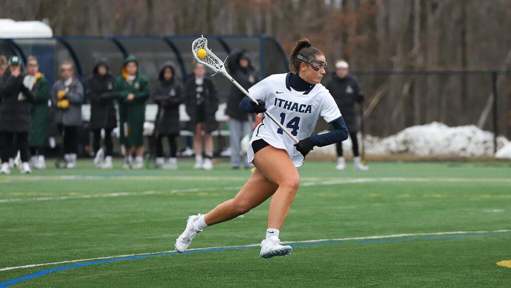 Junior attacker Maizy Veitch drives toward the cage in the Bombers 15–10 win over Clarkson University. Veitch tied her career-high in goals scored with six on the contest.