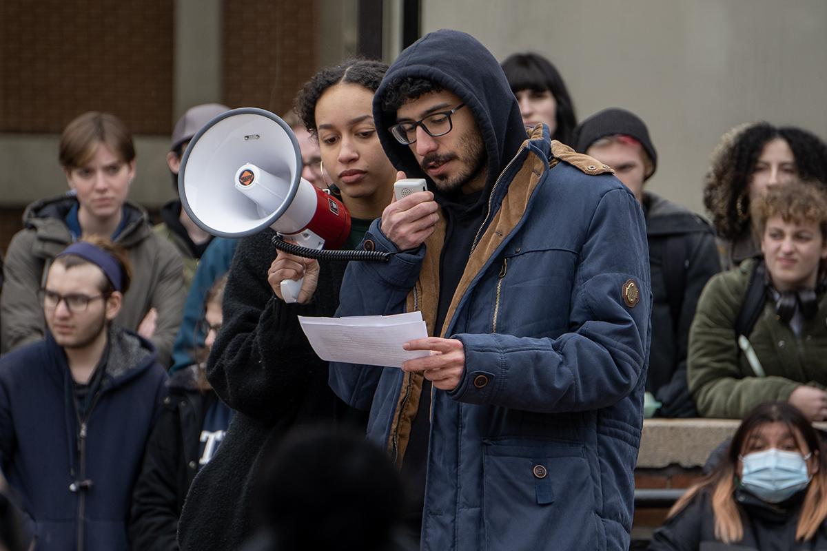 Seniors Journey Singleton and Thomas Attie thank the crowd for coming out to the protest and ask for people to keep sharing their stories beyond this gathering. Kevin Yu/The Ithacan