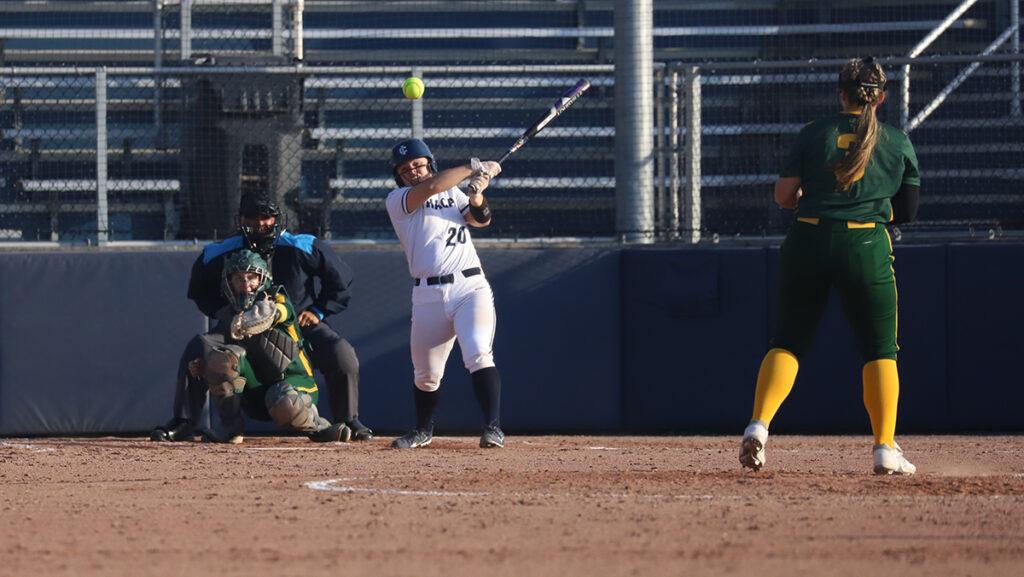 First-year+student+catcher+Haley+Petrucci+takes+a+swing+in+the+Ithaca+College+softball+teams+doubleheader+against+Clarkson+University.