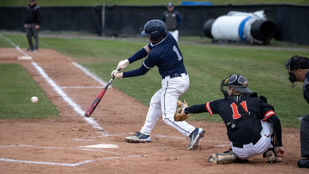 Senior outfielder Mike Nauta swings at a pitch in the Ithaca College baseball teams game against RIT on April 7.