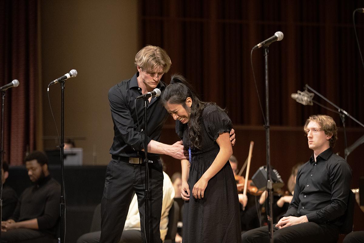 From left, sophomore Eli Vanderkolk performs as Captain Phoebus de Martin and senior Erica Reyes plays Esmeralda during one of the confrontational scenes in the second act. ANA GAVILANES/THE ITHACAN