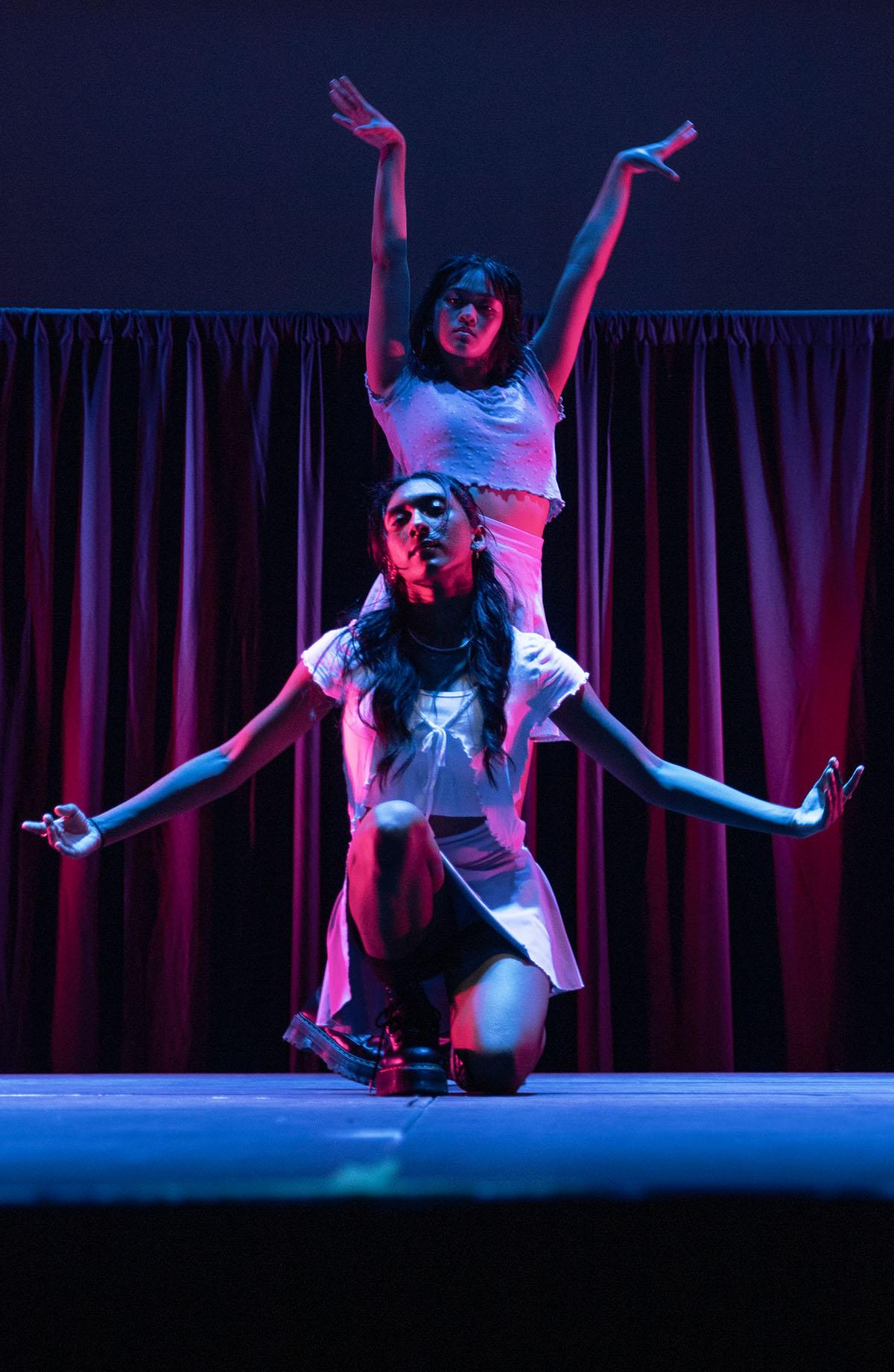 From front, first-year students Liz David and Minhty Ha pose at the beginning of their performance to Secret Story of the Swan by IZ*ONE. ANA GAVILANES/THE ITHACAN