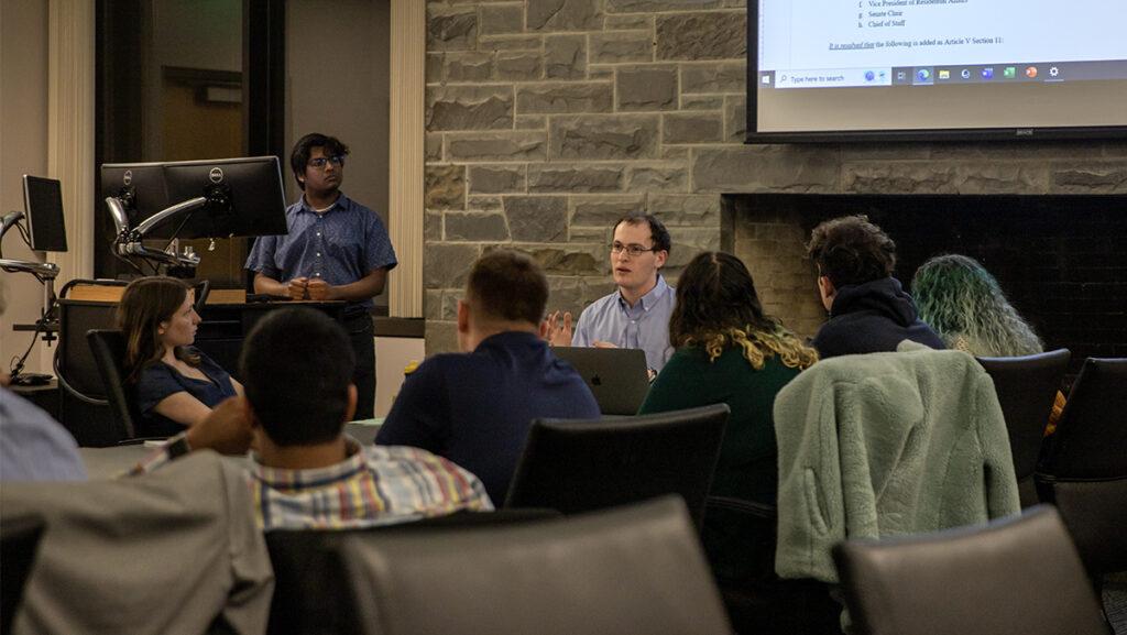 Senior Senate chair Austin Ruffino (center) presented a bill April 24 that focused on the merger of the SGC and the Residence Hall Association. Ruffino also presented an amendment to the SGC Constitution about re-writing sections for clarity.