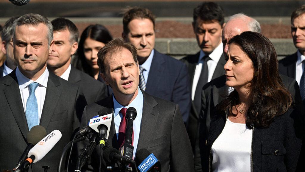Justin Nelson (center), joined by fellow members of the Dominion Voting Systems legal team, speaks to the media about Fox News’ settlement of a defamation case over falsehoods about the 2020 presidential election.