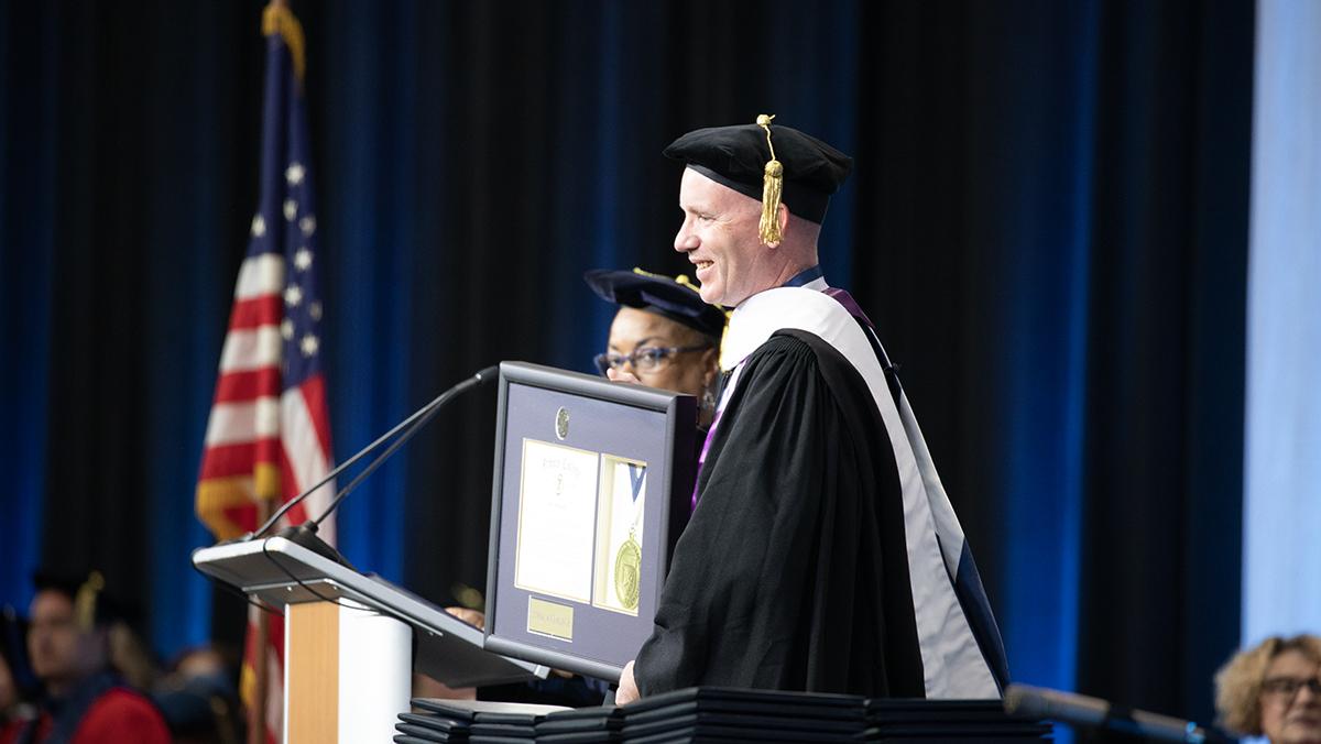 Loki Mulholland received an honorary Doctor of Letters degree from the college after not being able to complete his degree in 1994. NOLAN SAUNDERS/THE ITHACAN