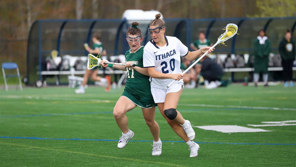 From left, Skidmore College junior attacker Gabriella Modesti rides Ithaca College junior defender Maggie Mandel in transition during the Bombers 11–4 win on May 2, 2023. The Bombers advanced to the Liberty League semifinals after.