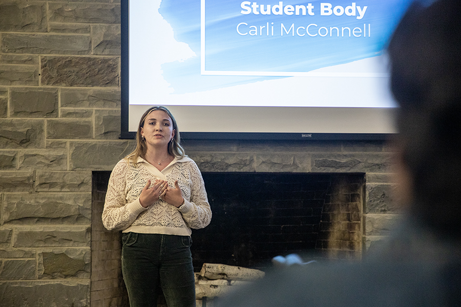 Senior Carli McConnell presents her campaign platform at the April 18 SGC meeting. McConnell was elected SGC president for the 2023–24 academic year. 