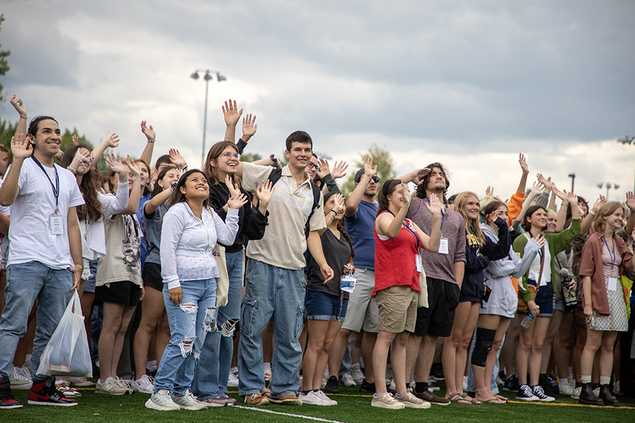Members of the Class of 2027 wave goodbye to drones at Higgins Stadium on Aug.18 while supporters watch via livestream during #ICYouLater. Hosted by New Student and Transition Programs, the event was a part of orientation.
