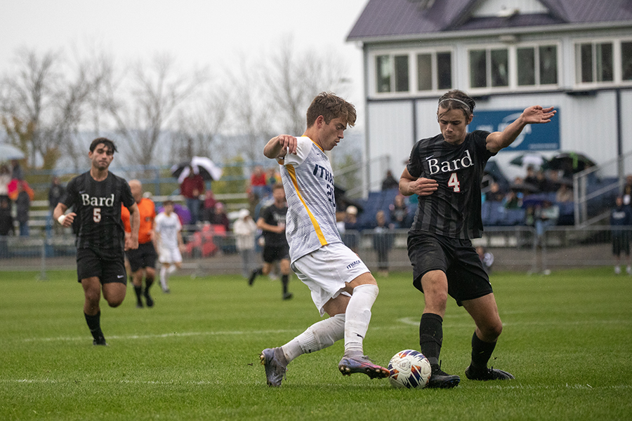From left, Bard Colleges first-year student midfielder Brandon Alchy runs to support as junior defender Landon Hellwig and first-year student defender James Bird fight for the ball.