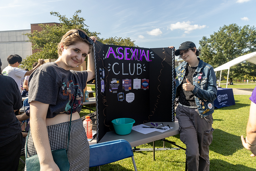 From left to right, sophomores Bella Dandrea and Caitlyn Wagner represent the Asexual Club, a new club at Ithaca College, at the student organization fair in August 2023.