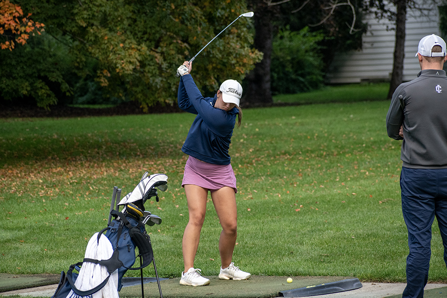 First-year Helena Winterberg prepares to swing at golf practice Sept. 26. Winterberg was named the Liberty League Rookie of the Week on Sept. 5 after her performance at the St. Lawrence Invitational.