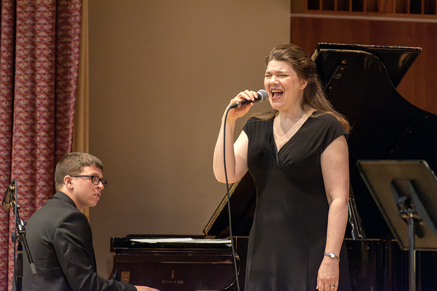 From left to right, pianist Andrew Woodruff 25 and vocalist Catherine Gale Titlebaum perform along with Ithaca College Jazz Ensemble on Sept. 9 during an educational jazz concert for children and families.