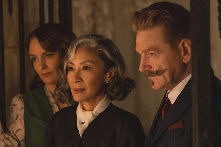 Tiny Fey, Michelle Yeoh and Kenneth Branaugh work to solve the murder mystery in A Haunting in Venice.