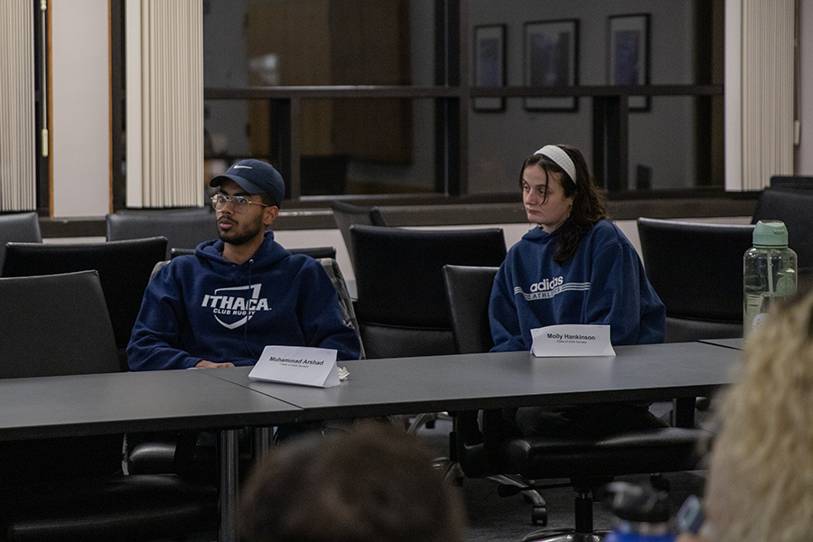From left, Junior Muhammad Arshad, class of 2025 senator and senior Molly Hankinson, class of 2024 senator, attend the SGC meeting held Oct. 16 to hear updates from their colleagues.