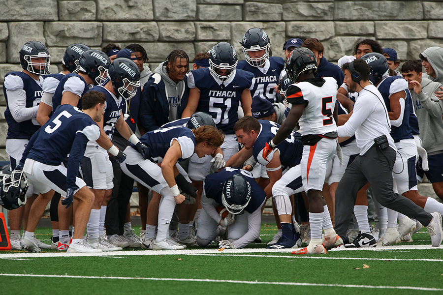 The Bombers sideline hypes up a teammate that was pushed out of bounds in a 62–0 victory against Buffalo St. Oct. 28. The Bombers head into the 64th Cortaca jug game at 8–1 on the season.