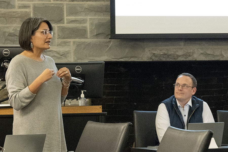 From left, Belisa Gonzalez, professor of sociology and dean of faculty, equity, inclusion, and belonging, and David Gondek, associate professor in the Department of Biology and chair of the Faculty Council, discuss the low response rate for the Campus Climate Survey which is currently about 15%.