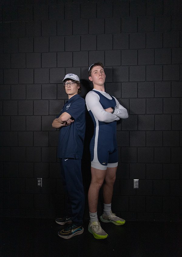 From left, Junior oarsman Miles Kennaston and junior rower Riley Maynard will look to the leadership of head coach Justin Stangel to lead them to a Liberty League title.