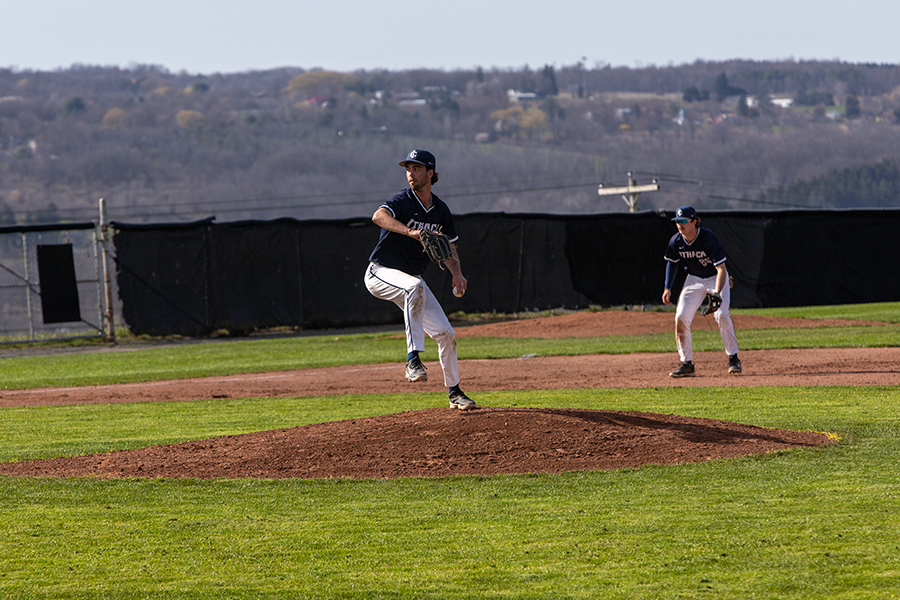 Senior+pitcher+Sean+Kelly+winds+up+and+kicks+his+leg+as+he+gets+ready+to+fire+a+pitch+to+home+plate+on+April+9.+The+Bombers+held+off+a+late+rally+and+defeated+the+Continentals+12%E2%80%9311.