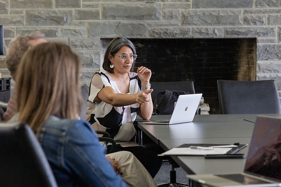 Belisa González, dean of faculty equity, inclusion, and belonging and co-chair of the Campus Climate Committee, moderated a Key Findings Report meeting where faculty discussed the high faculty dissatisfaction rate reported in the Campus Climate Survey. 