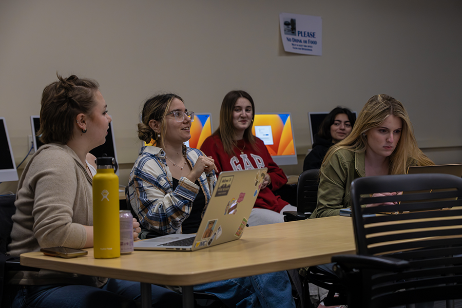 Juniors Jaime von Bartheld and Julia Freitor, first-year students Nicki Meskos and Gabby Patino, and senior Kaylee Maietta during one of their planning meetings for The Park Convention.