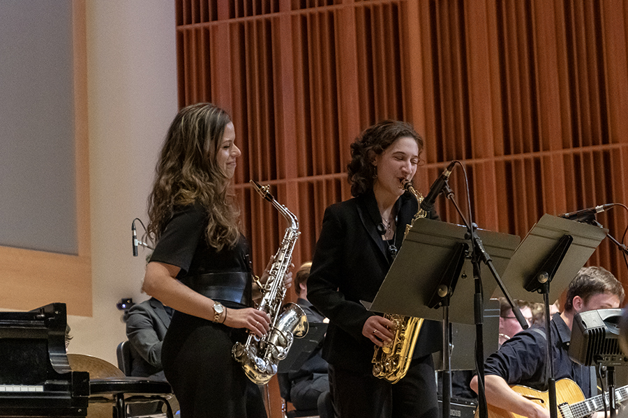 Award-winning saxophonist Alexa Tarantino, and sophomore Grace Gonoud duet on alto saxophones during Tarantinos visit to Ithaca College on April 27.