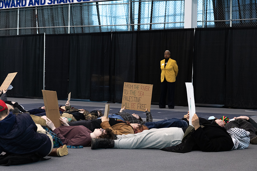 President La Jerne Cornish stands in the Athletics and Events Center while student demonstrators participated in a die-in during an admissions event for admitted and prospective students at Ithaca College.