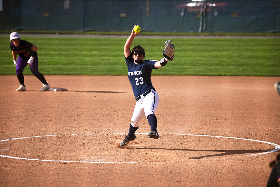 First-year student Taylor Brunn winds up in a game against Alfred University on April 9. Brunn, first-year pitcher Mady Rowell and senior pitcher Ainsley Rogers had not pitched in a collegiate game prior to this season but have played key roles in 2024.