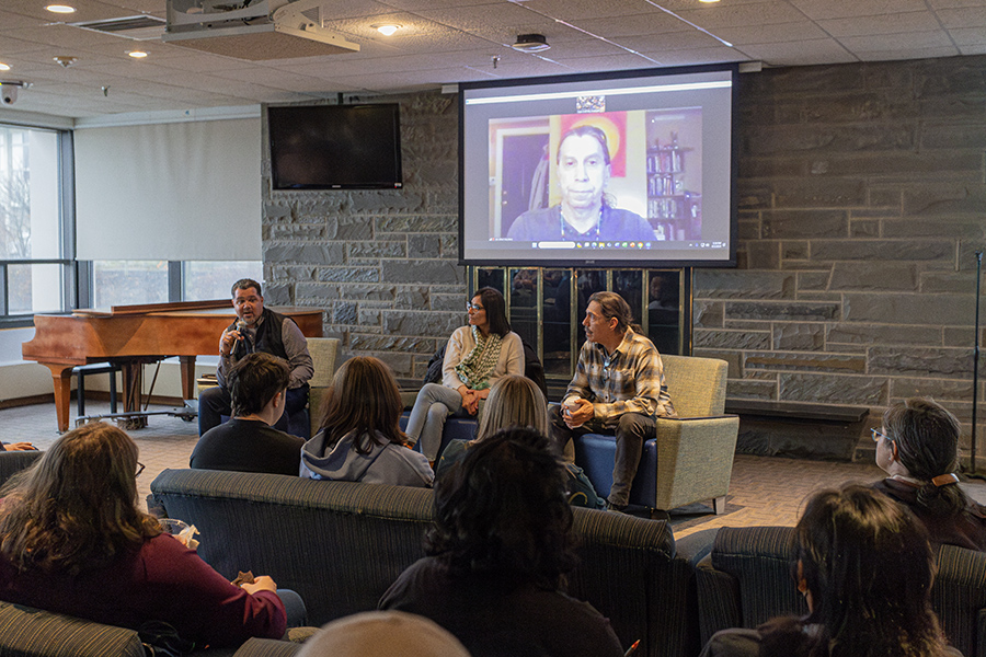 From left, Sean Eversley Bradwell, assistant professor in the Department of Education and chair of CSCRE, facilitating a conversation with Gayogo̱ hó:nǫˀ Learning Project members Michelle Seneca, outreach and engagement lead; Stephen Henhawk, language and culture lead; and Advisory Board Member Jim Wikel.