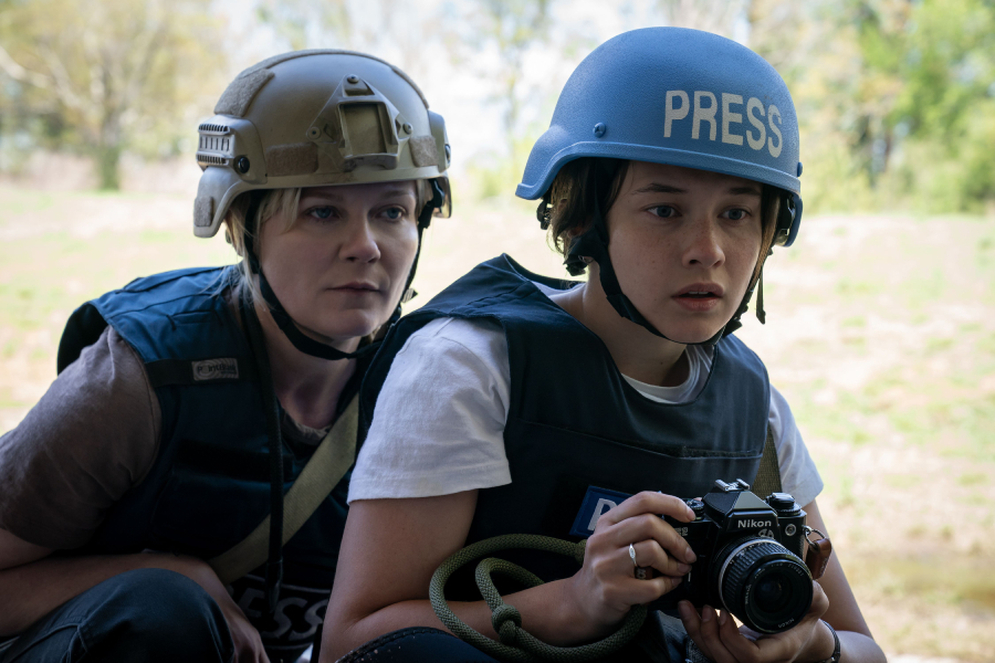 Lee Smith (Kirsten Dunst) and Jessie (Cailee Spaeny) attempt to reach D.C. before the rebels take over the city in the film Civil War, released April 12.