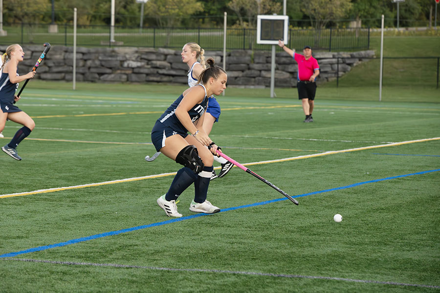 Senior midfielder Emma Garver plays a pass at midfield in the Bombers' 1-0 victory over the Misercordia University Cougars. The Bombers' record goes to 3-0 for the season.