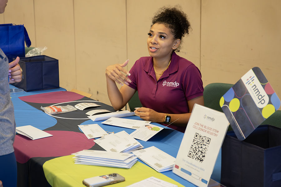 The Ithaca College Department of Intercollegiate Athletics hosted its annual "Be the Match" bone marrow drive Sept. 19. Pictured, Maybelline Amaya of NMDP directs the student-athlete volunteers.