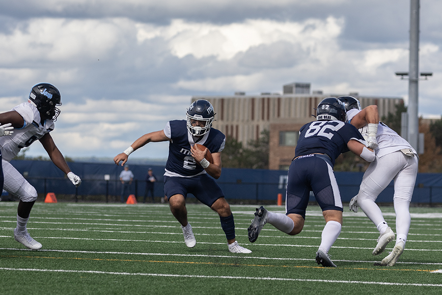 The #20 Ithaca College football team fell to the #8 Johns Hopkins Blue Jays at Butterfield Stadium Sept. 7. Pictured, senior running back Jake Williams cuts up field for the Bombers.