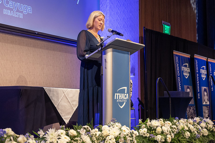 Ithaca College women's basketball alum Katherine Bixby ’10 speaks at the Ithaca College Athletics Hall of Fame Reception. Bixby is now an assistant coach at the University of North Carolina.