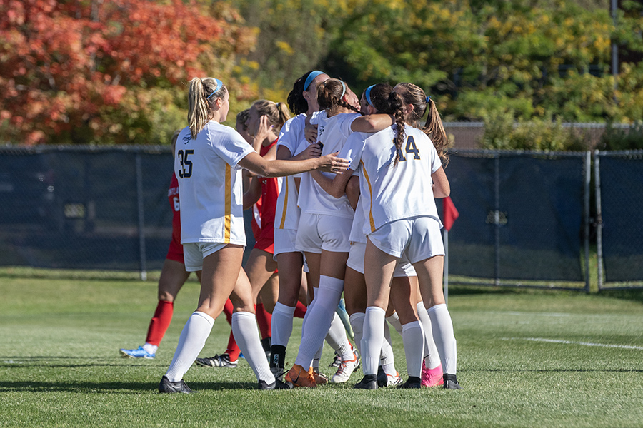 The Ithaca College women's soccer team fought to a draw with the Alfred Univeristy Saxons Sept. 17. Pictured, the Bombers go in for a group huddle in their Sept. 11 match with the No. 24 SUNY Cortland Red Dragons.