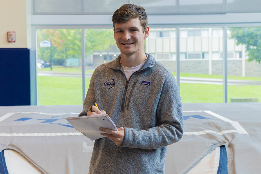 Pictured, former pole-vaulting national champion Dominic Mikula ’24 has begun his new role as an assistant coach for the Ithaca College men’s and women’s track and field teams. 