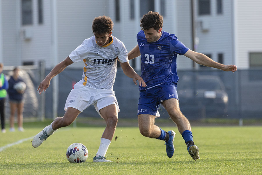 During the Ithaca College men's soccer team's 2-0 loss, sophomore midfielder Cameron Wooten dribbles the ball while Continentals junior defender Jameson Mannix attempts to steal it.