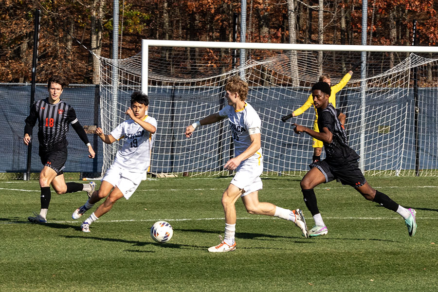 The Ithaca College men's soccer team fell to the Rochester Institute of Technology Tigers, 2-1 Oct. 30. From left to right, first-year midfielder/forward Emmett Enriquez and senior midfielder Connor Tierney converge on the ball.