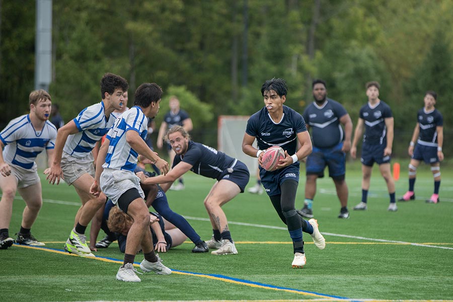 Sophomore team captain Michael Morales advances the ball upfield against the Geneseo Warthogs Rugby Club. The Ithaca College men’s rugby club finished the Fall 2024 regular season with a 2-3 record.