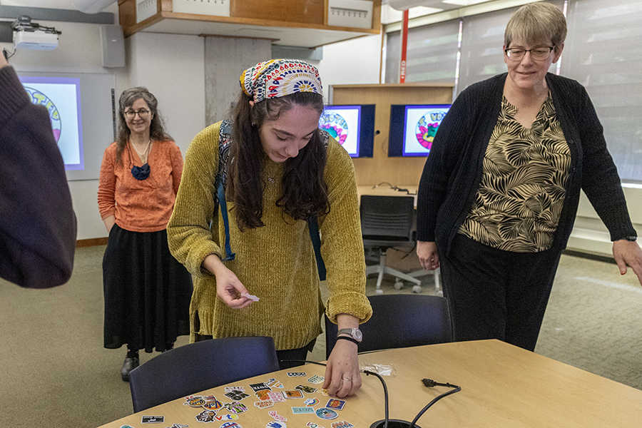 From left, Cathy Michael, communications librarian, junior Maria Lesser and Doreen Hettich-Atkins, executive director of the Office of Student Affairs and Campus Life. 