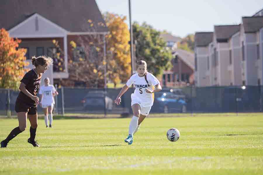 The Ithaca College women's soccer team slipped past the St. Lawrence Saints 1-0 Oct. 5. Pictured, Sophomore forward Jayne Bogel pushes the ball upfield for the Bombers.