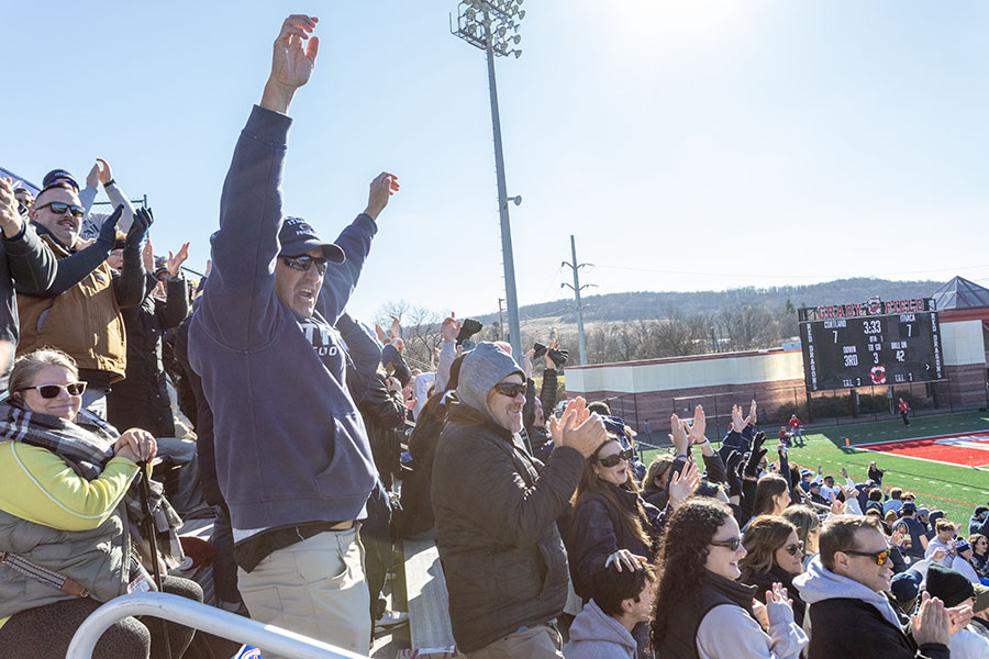 Bombers' fans cheer on the team.