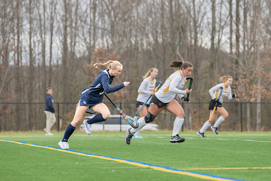 Sophomore striker Ainsley Grant races to the ball.