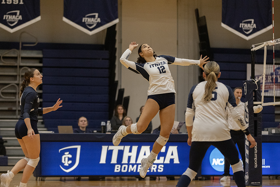 Pictured, sophomore outside hitter Gabriela Gonzalez-Abreu goes up for a spike against the Rochester Institute of Technology Tigers on Nov. 15. Gonzalez-Abreu delivered a standout performance, leading the team with 11 kills.