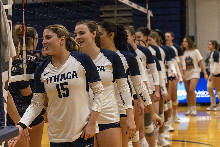 Led by sophomore setter Wesley Slavin, the Ithaca College volleyball team get ready for their match against the Nazareth University Golden Flyers on Nov. 10. 