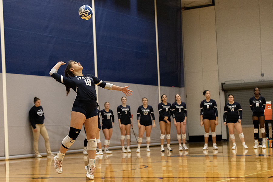 The Ithaca College volleyball team defeated the Bard College Raptors in three sets. Pictured, graduate-student defensive specialist/libero Julia Costa sets up to serve.