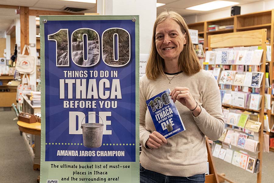 Amanda Jaros Champion celebrates the release of her book, "100 Things to Do in Ithaca Before You Do," at Buffalo Street Books on Fri. Nov 29. 