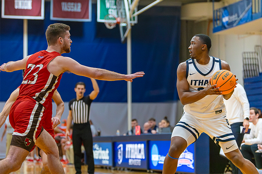 First-year standout Chris Leysath faces up against a defender against Saint Lawarence University during the Bomber's most recent conference victory on Jan. 18